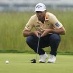 Sam Burns en Sungjae Im jagen op Scottie Scheffler